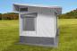 Preview: Nordkap LIGHT freistehendes Zelt 450 × 250 cm aufgebaut neben Wohnwagen